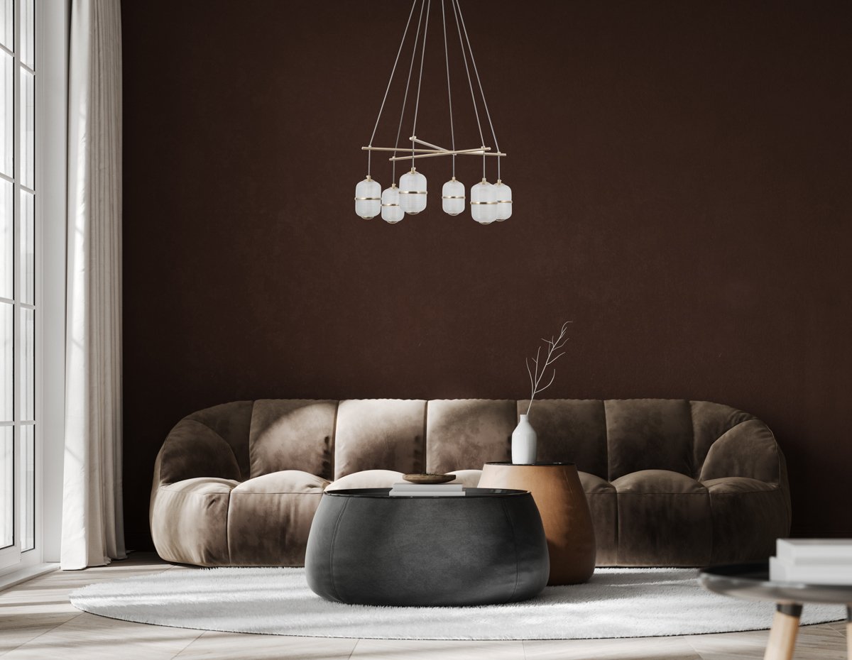 Modern interior with brown sofa and empty brown mock up wall background