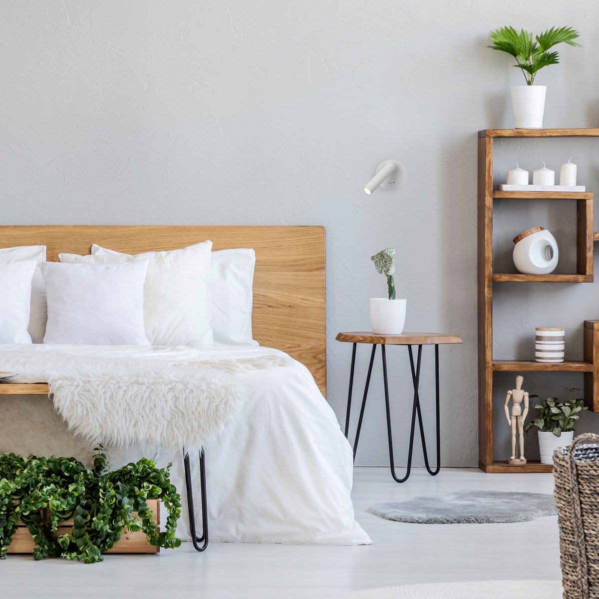 Patterned pouf and basket in bright bedroom interior with lamps, plants and poster next to bed. Real photo Sieninis LED šviestuvas CARDA 2.5W baltos spalvos - Image 2